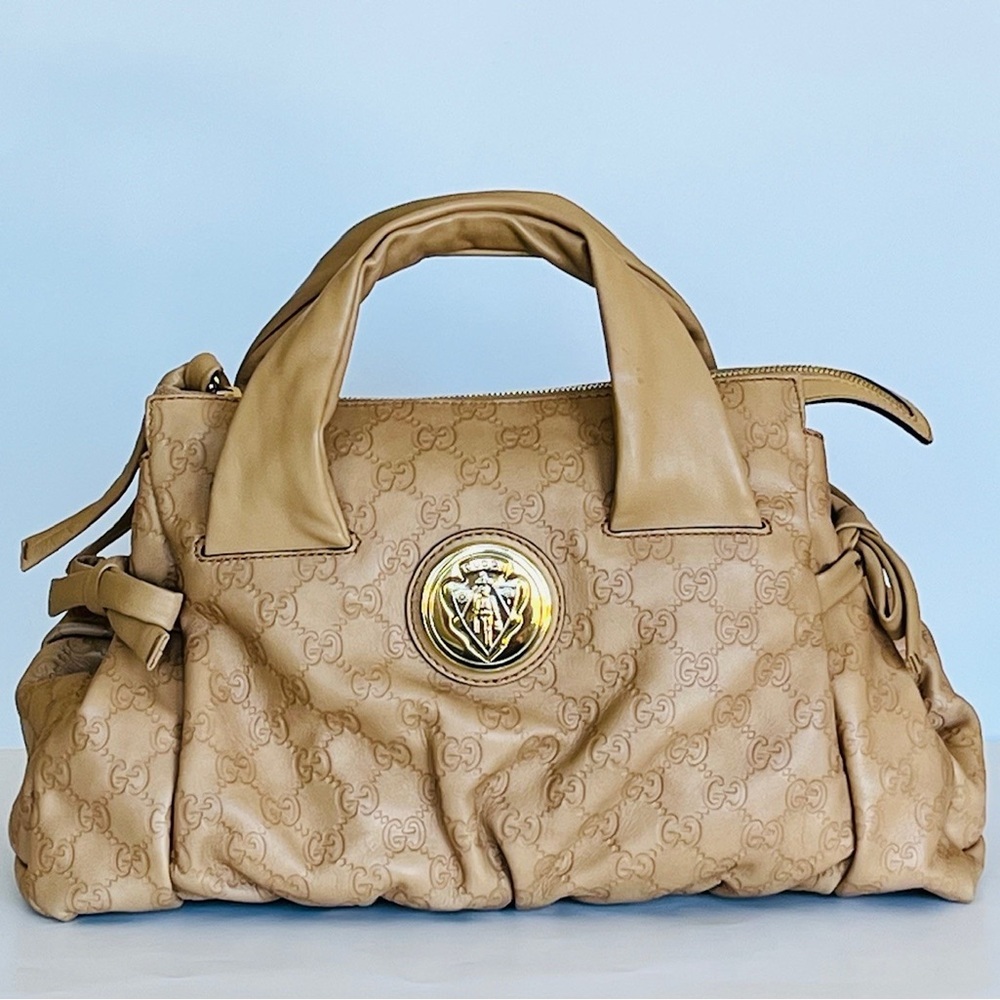 Gucci embossed leather bag